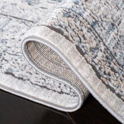 Oregon Light Blue and Ivory Synthetic Medallion Area Rug 6' x 9'