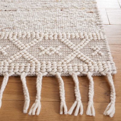 Ivory and Beige Handwoven Wool Area Rug with Tassels, 3' x 5'