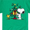 Boys' - Peanuts - Snoopy and Woodstock Christmas Skating Short Sleeve Graphic T-Shirt - 2 of 4