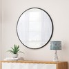 Lyngins Black Circular Wall Mirror, Metal Framed Bathroom Mirror, Modern Bathroom Decor, Fog-Proof Mirrors for Bathroom Sink & Home Spaces - 2 of 4