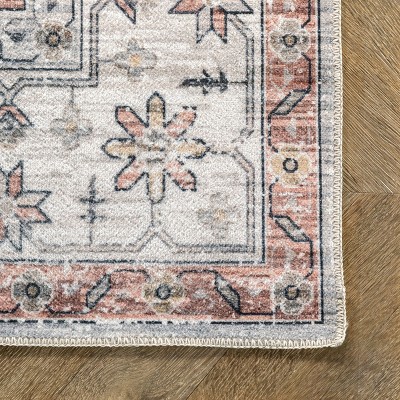 4' x 6' Orange and White Medallion Washable Synthetic Rug