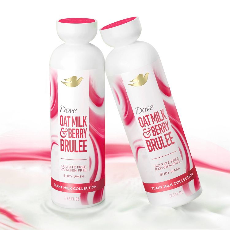 Dove Oat Milk & Berry Brulee Body Wash, 17.5 fl oz, from the Plant Milk Collection. The bottles, with a soft white and pink swirl design and a golden dove logo, convey a sulfate-free and paraben-free formula. 