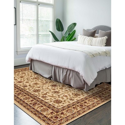 Ivory Floral Rectangular 6' x 9' Synthetic Area Rug