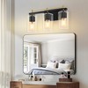 DAKAFUL Modern Bathroom Vanity Light, Vanity Fixture with Black+Gold/Silver Frame&Clear Glass Shade, Wall Light for Mirror, Bedroom, Bathtub Area - 3 of 4