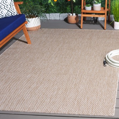 Beige Solid Stain-Resistant Indoor/Outdoor Area Rug 5'3" x 7'6"