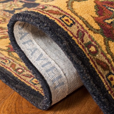 Elegant Jaipur Heritage Black and Gold 5' x 8' Wool Area Rug