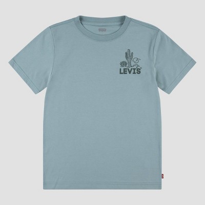 white and dark green graphic tee