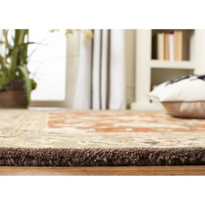 Handmade Rust and Green Wool Rectangular Area Rug 9'6" x 13'6"