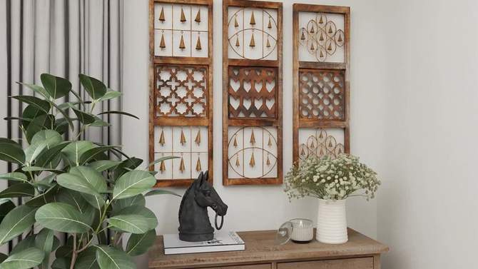 Wood Geometric Intricately Carved Wall Decor with Bells Set of 3 Brown - Olivia &#38; May, 2 of 19, play video