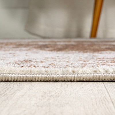 Ivory and Brown Medallion Synthetic 8' x 10' Area Rug