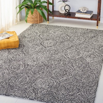 Handmade Black and Ivory Wool Tufted Area Rug, 5' x 8'