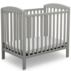 Delta Children Sprout Mini Crib With Adjustable Height and Mattress - 1 of 4