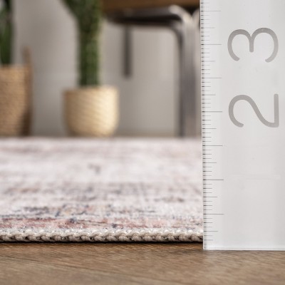 4' x 6' Orange and White Medallion Washable Synthetic Rug