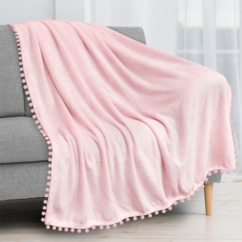 PAVILIA Fleece Pom Pom Blanket Throw for Sofa Bed Soft Lightweight Pompom Fringe Blanket for Couch Light Pink Throw 50x60