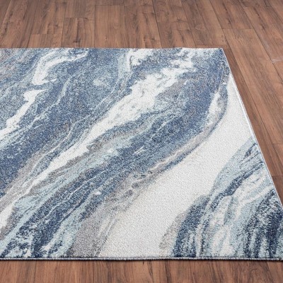 Blue and White Abstract 8' x 10' Synthetic Area Rug