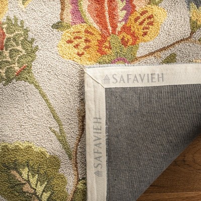 Handmade Light Blue Floral Wool Rectangular Area Rug