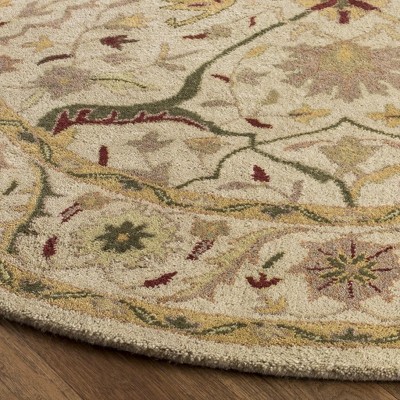 Elegant Ivory Oval Hand-Tufted Wool Area Rug, 7'6" x 9'6"