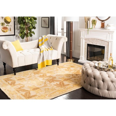 Elegant Ivory & Gold Hand-Tufted Wool Area Rug - 5' x 8'