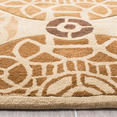 Capri 6' x 9' Gold and Multi Hand-Tufted Wool Area Rug