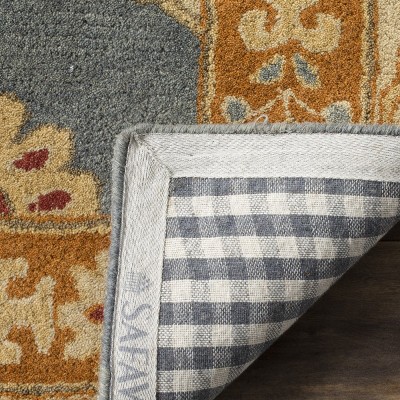 Hand-Tufted Blue and Rust Wool 5' x 8' Area Rug