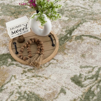 Green and Cream Abstract Polypropylene Area Rug 6'7" x 9'