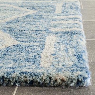 Blue and Ivory Hand-Tufted Wool 4' x 6' Area Rug