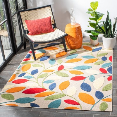 Ivory and Green Geometric Synthetic Indoor/Outdoor Rug