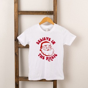 The Juniper Shop Believe In The Magic Santa Toddler Short Sleeve Tee - 1 of 2