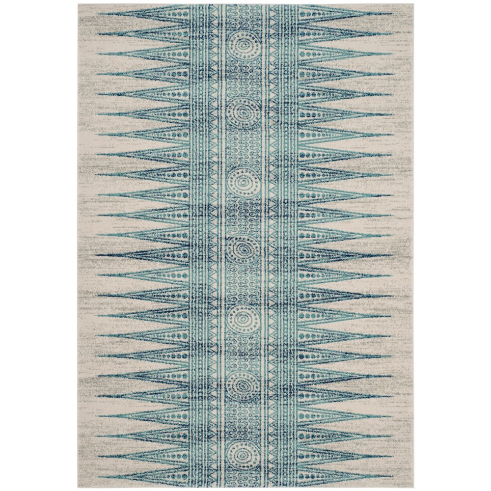 6'7inx9' Geometric Design Loomed Area Rug Ivory/Turquoise - Safavieh