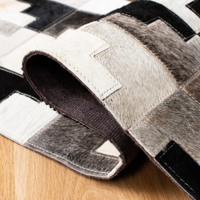 Ivory and Black Geometric Cowhide Patchwork Area Rug 8' x 10'