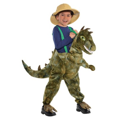 kid riding a dinosaur costume