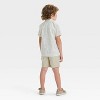 OshKosh B'gosh Toddler Boys' Short Sleeve Paisley Graphic Top and Woven Shorts Set - Khaki/Cream - 2 of 4