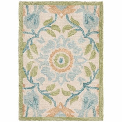 Antiquity AT59 Hand Tufted Area Rug  - Safavieh