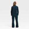 Women's Plaid Flannel Long Sleeve Shirt and Pants Holiday Matching Family Pajama Set - Wondershop™ Navy Blue - 2 of 4