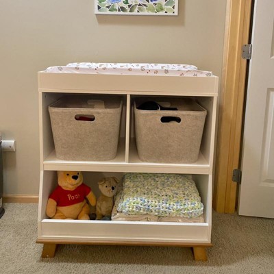 Cube storage outlet changing table