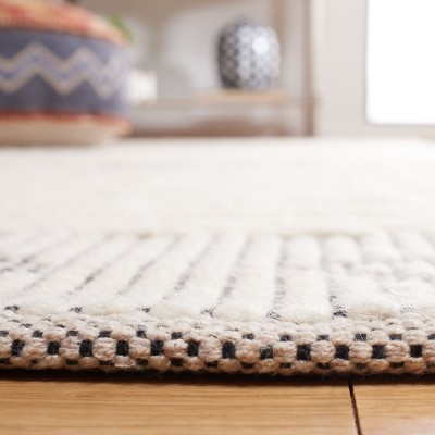 Ivory and Black Flat Woven Wool Area Rug 4' x 6'