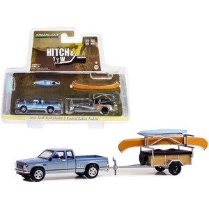 1988 GMC S-15 Sierra Truck Blue Met. & White w/Stripes & Canoe Trailer & w/Canoe & Kayak 1/64 Diecast Model Car by Greenlight - 1 of 3