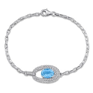 EVERLY JEWELRY | Sterling Silver 3 7/8 CT TGW White Topaz Sky Blue Topaz Bracelet, 7 inch - 1 of 4