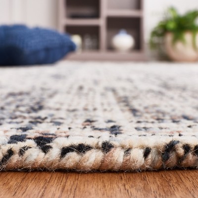 Handmade Black and Beige Abstract Wool Area Rug, 4' x 6'