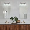 LLHZSY 3/4/5 Light Modern Dimmable Crystal Bathroom Vanity Light Wall Sconces with Crystal Shades - Black and Gold/Chrome - 2 of 4