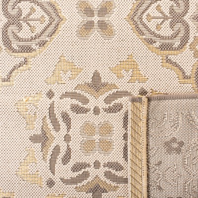 Beige Rectangular Easy Care 5' x 7' Synthetic Area Rug