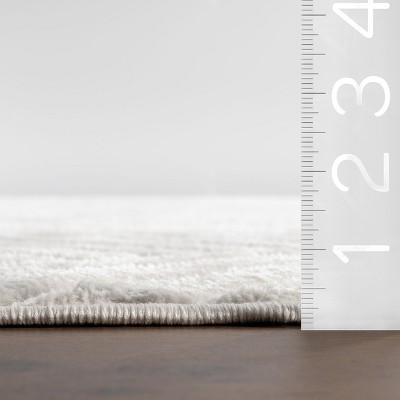 Ivory Geometric High-Low Indoor/Outdoor Area Rug
