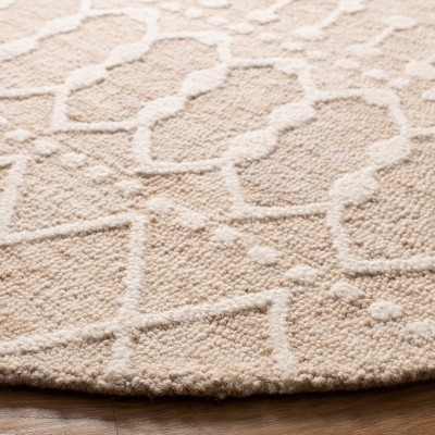 Ivory and Beige Hand Tufted Wool Round Floral Rug