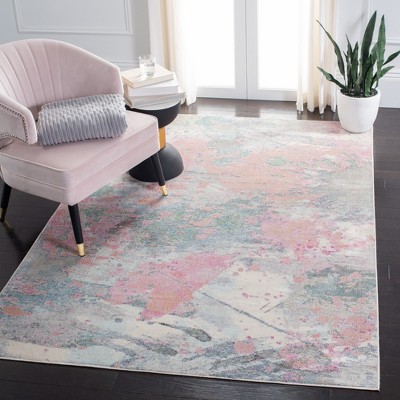 Ivory and Pink Abstract Synthetic Area Rug