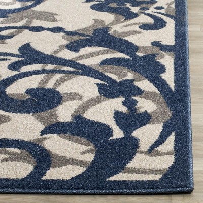 Ivory and Navy Floral Square Synthetic Area Rug