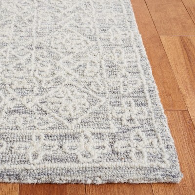 Ivory Wool 4' x 6' Hand Tufted Rectangular Rug