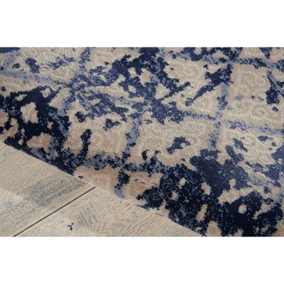 Ivory and Navy Blue Medallion 2'2" x 7'6" Synthetic Area Rug
