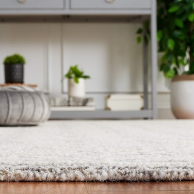 Ivory Wool 4' x 6' Hand Tufted Rectangular Rug