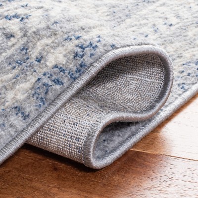 Ivory and Light Grey Synthetic Reversible Area Rug