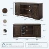 Homhougo Farmhouse TV Stand for TV up to 65 Inches, Entertainment Center with Sliding Barn Doors and Adjustable Shelf, Brown - 2 of 4
